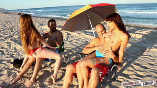 Fun on beach makes lovely chicks in mood for incest foursome with dads